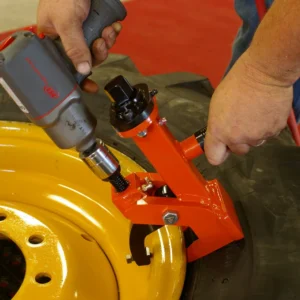 Pneu-Tek Bead Breaker in action removing tire bead from rim using impact wrench